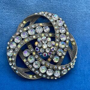 Vintage rhinestone knot brooch with fine metal detail pewter
